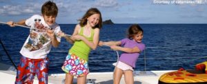 Children help with the sailing