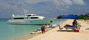 Beach party aboard a Nicholson charter yacht